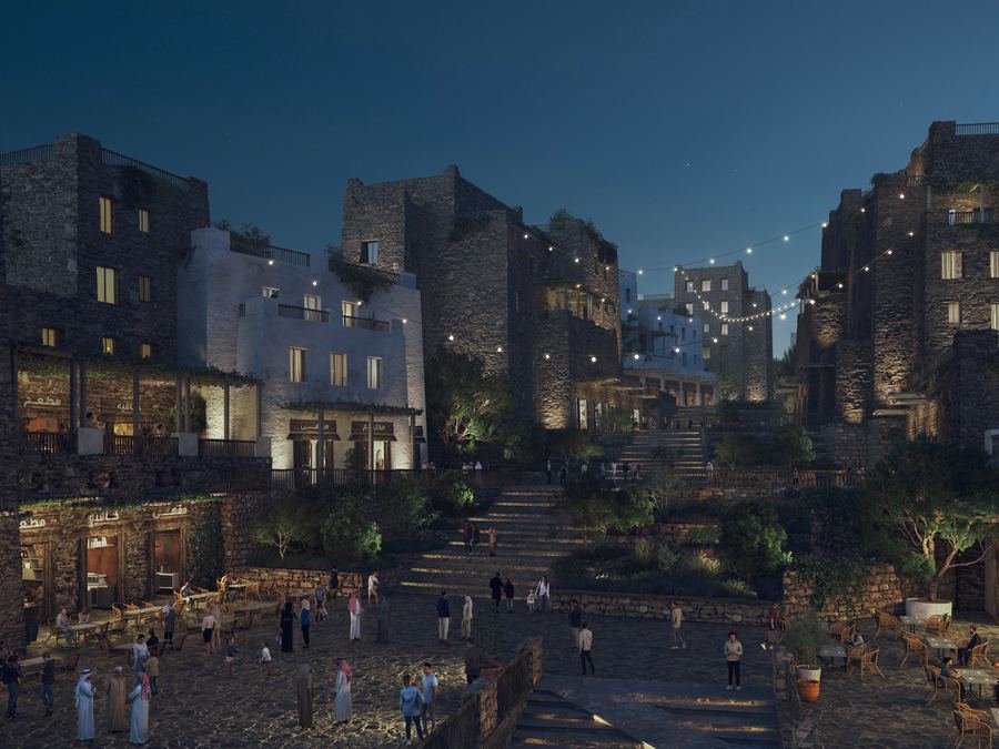 Soudah Peaks, Saudi Arabia — stone village terraces lit at night