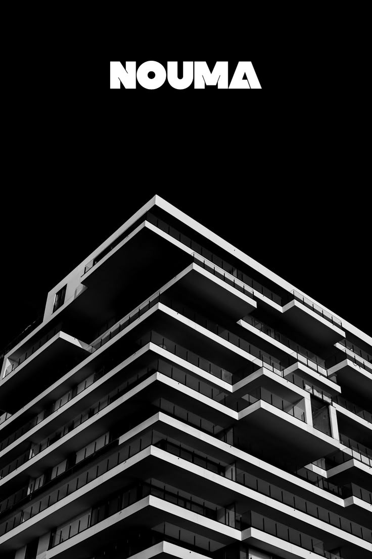 Stacked balconies against a black sky